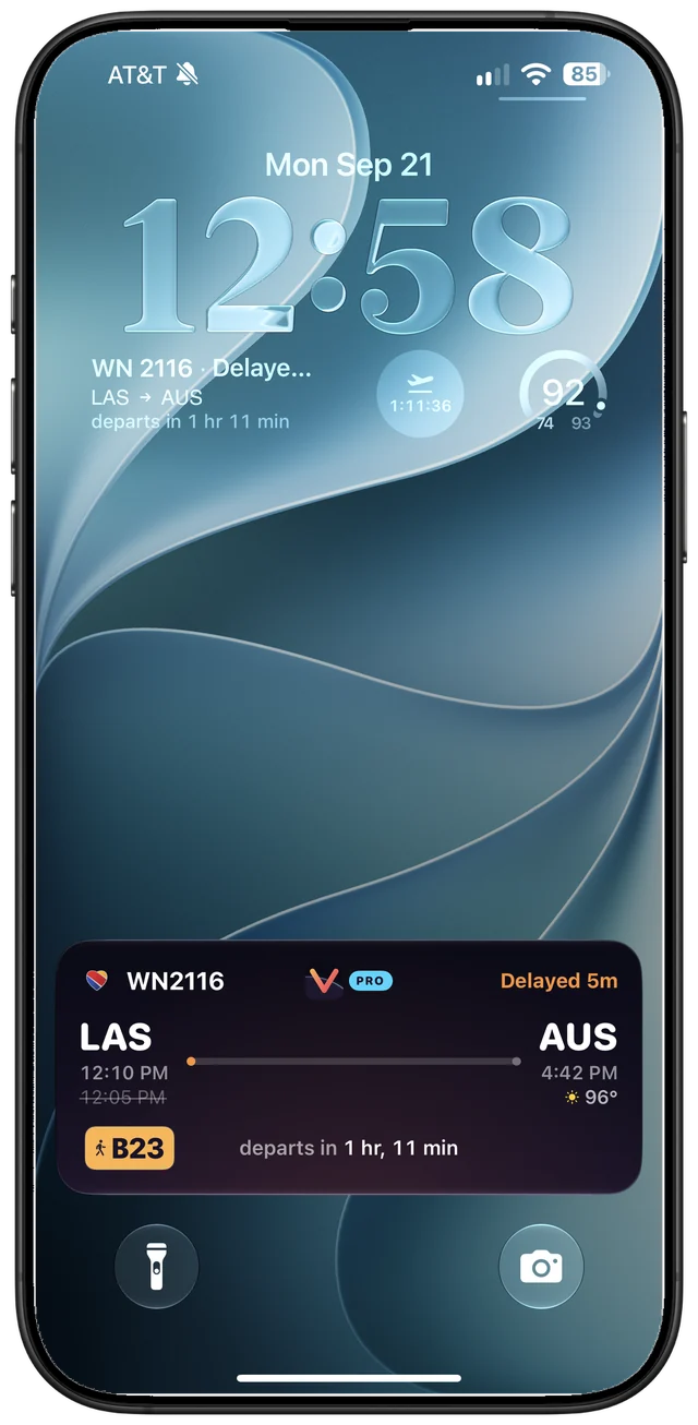 A Vrolu Live Activity on the iPhone Lock Screen: gate, delay, and departure countdown